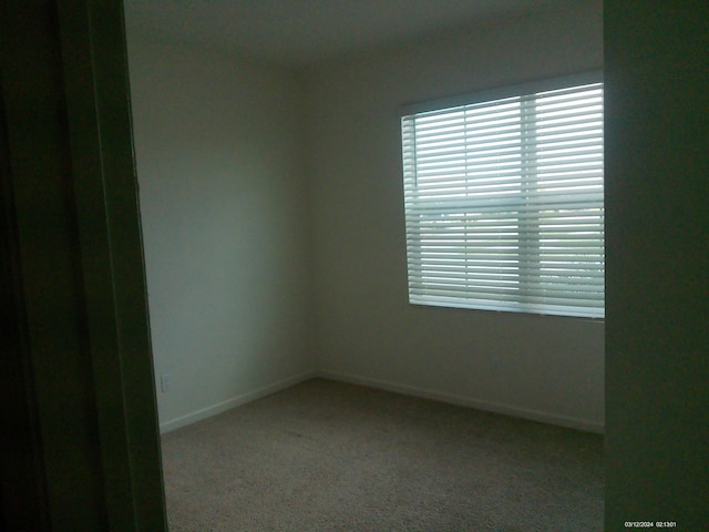 10574 SW Jem St, Port Saint Lucie, FL 34987 - empty room with carpet and baseboards