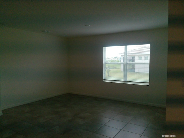 10574 SW Jem St, Port Saint Lucie, FL 34987 - unfurnished room with baseboards and tile patterned floors