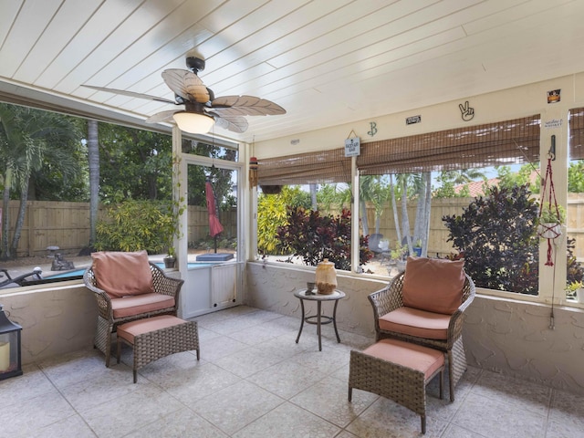 1155 Woodcrest Rd W, West Palm Beach, FL 33417 - sunroom / solarium with ceiling fan and tile patterned flooring