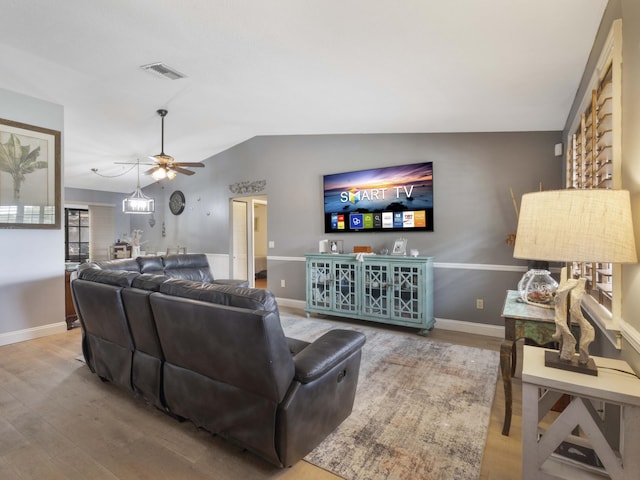 1155 Woodcrest Rd W, West Palm Beach, FL 33417 - living area with lofted ceiling, wood finished floors, and a ceiling fan