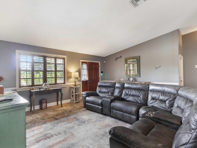 1155 Woodcrest Rd W, West Palm Beach, FL 33417 - carpeted living room featuring vaulted ceiling