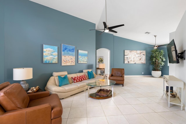 7200 NW Turtle Walk, Boca Raton, FL 33487 - living room with a ceiling fan, high vaulted ceiling, light tile patterned floors, and arched walkways