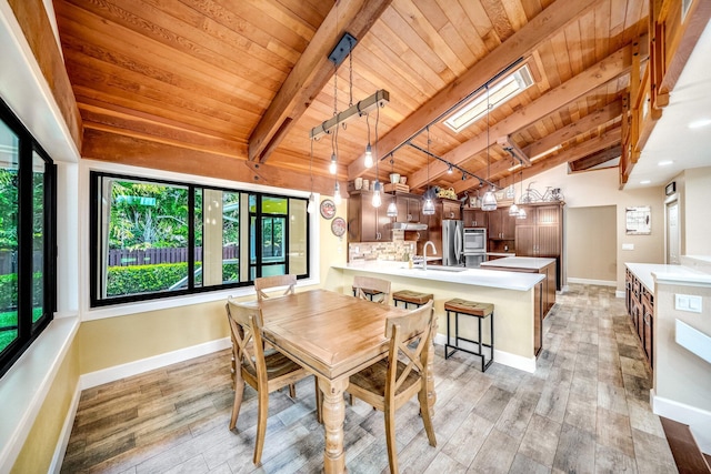 1819 SW Crane Crk, Palm City, FL 34990 - dining space with wooden ceiling, light wood finished floors, and healthy amount of natural light