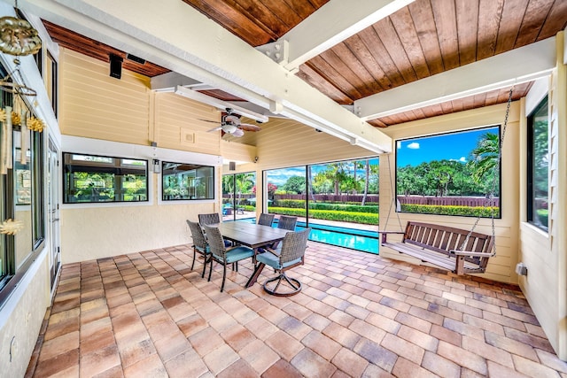 1819 SW Crane Crk, Palm City, FL 34990 - sunroom / solarium with ceiling fan, healthy amount of natural light, and beamed ceiling
