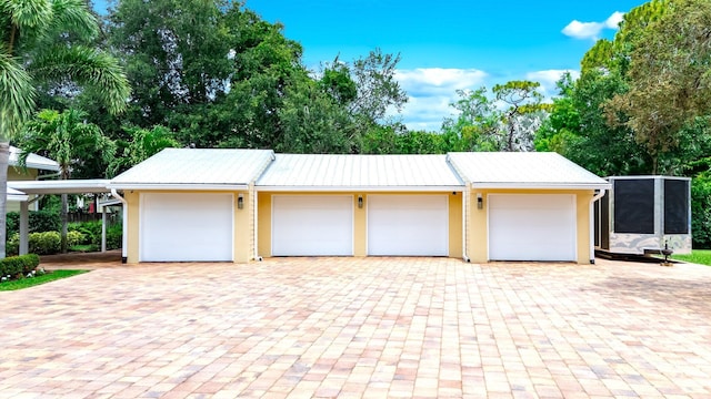 1819 SW Crane Crk, Palm City, FL 34990 - garage featuring decorative driveway