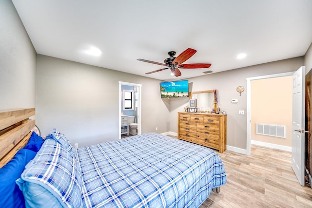 1819 SW Crane Crk, Palm City, FL 34990 - bedroom featuring light wood-style floors, recessed lighting, a ceiling fan, and ensuite bath