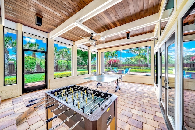 1819 SW Crane Crk, Palm City, FL 34990 - sunroom / solarium featuring ceiling fan, beam ceiling, and french doors