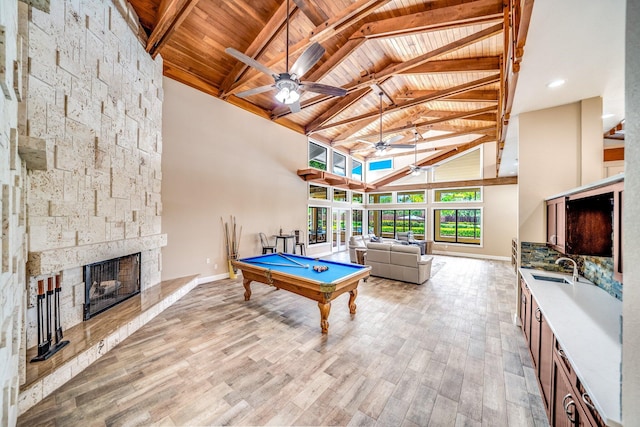 1819 SW Crane Crk, Palm City, FL 34990 - game room with a ceiling fan, a wooden ceiling with exposed beams, high vaulted ceiling, billiards, and a fireplace