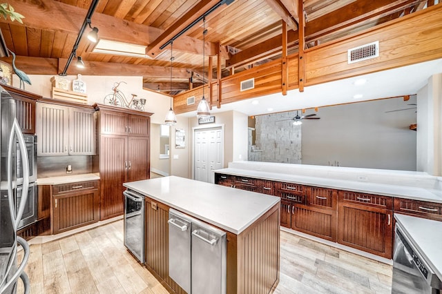 1819 SW Crane Crk, Palm City, FL 34990 - kitchen with a wooden ceiling with exposed beams, light wood finished floors, a kitchen island, light countertops, and ceiling fan