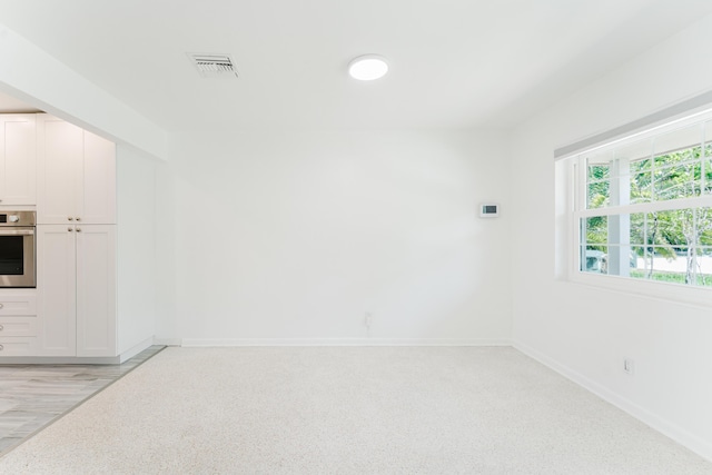 450 NE 38th St, Boca Raton, FL 33431 - empty room featuring baseboards
