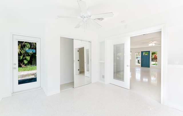 450 NE 38th St, Boca Raton, FL 33431 - unfurnished bedroom featuring ceiling fan and baseboards