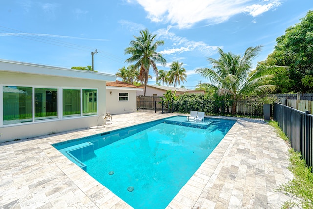 450 NE 38th St, Boca Raton, FL 33431 - view of pool with a patio area and a fenced backyard