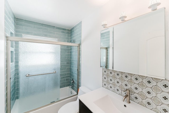 450 NE 38th St, Boca Raton, FL 33431 - full bathroom featuring enclosed tub / shower combo, decorative backsplash, and vanity