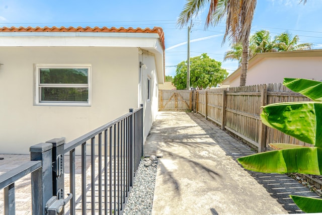 450 NE 38th St, Boca Raton, FL 33431 - view of patio / terrace with a gate