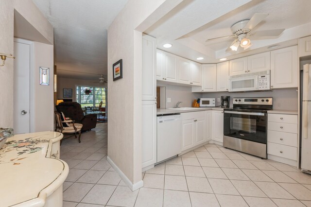 230 NE 26th Ave Unit 213, Boynton Beach, FL 33435 - view of asphalt street with curbs