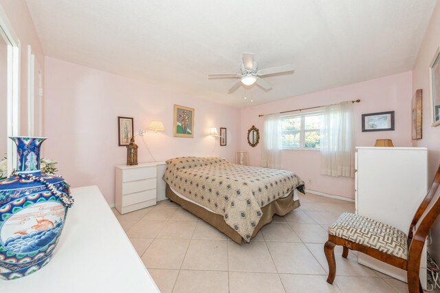 230 NE 26th Ave Unit 213, Boynton Beach, FL 33435 - kitchen with white appliances, a raised ceiling, light tile patterned floors, light countertops, and recessed lighting