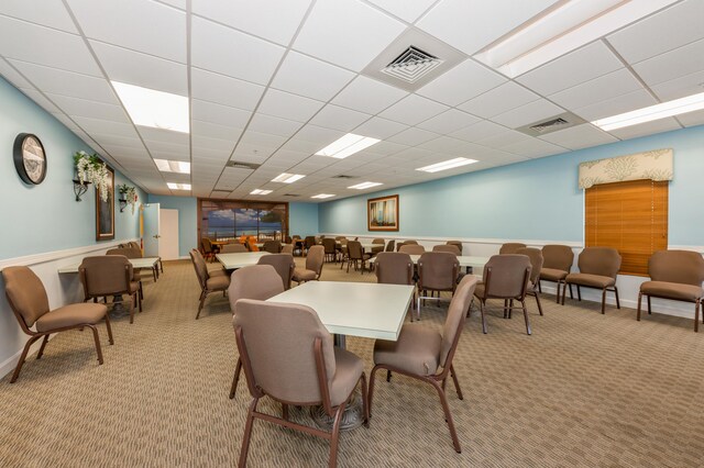 230 NE 26th Ave Unit 213, Boynton Beach, FL 33435 - building lobby with crown molding and a wall of windows