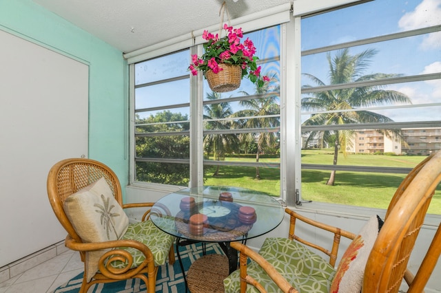 230 NE 26th Ave Unit 213, Boynton Beach, FL 33435 - sunroom / solarium with outdoor dining space