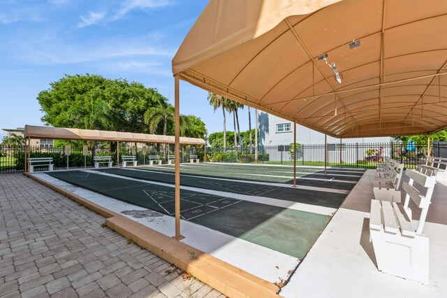 230 NE 26th Ave Unit 213, Boynton Beach, FL 33435 - community pool with a patio