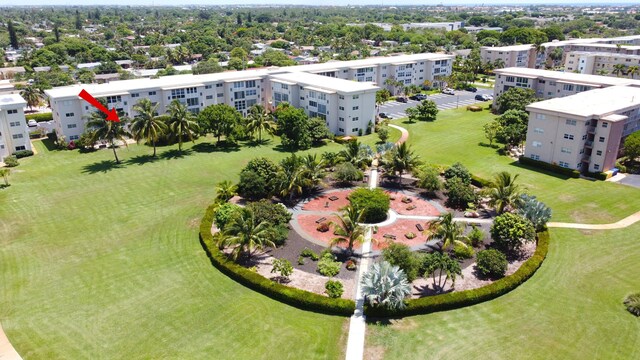 230 NE 26th Ave Unit 213, Boynton Beach, FL 33435 - community pool featuring a community hot tub and a patio