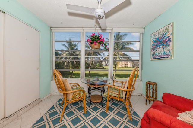 230 NE 26th Ave Unit 213, Boynton Beach, FL 33435 - dining area with a textured ceiling, a skylight, and expansive windows