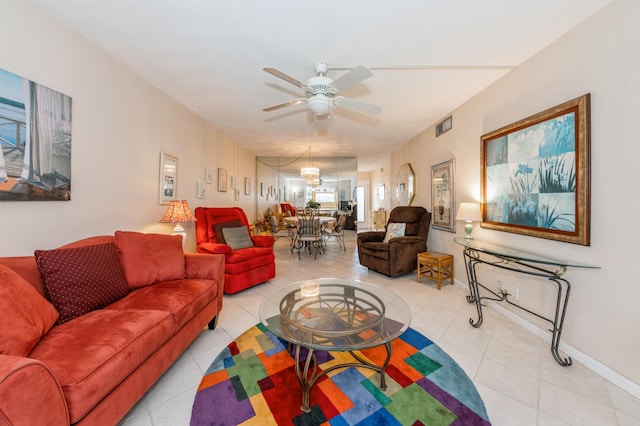 230 NE 26th Ave Unit 213, Boynton Beach, FL 33435 - living room with a ceiling fan and light tile patterned floors