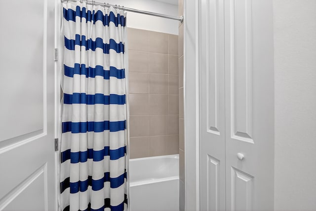 14929 Three Ponds Trl, Delray Beach, FL 33446 - bathroom featuring shower / bath combination with curtain