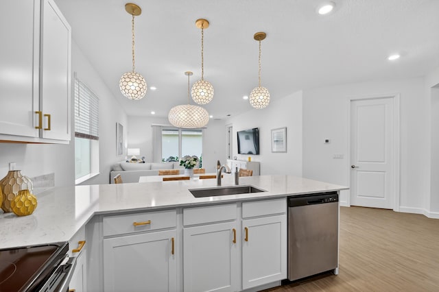 14929 Three Ponds Trl, Delray Beach, FL 33446 - kitchen with dishwasher, black / electric stove, a peninsula, light stone countertops, and open floor plan