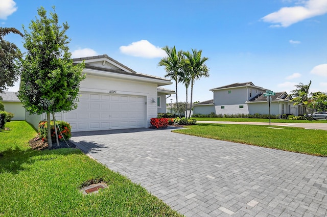 14929 Three Ponds Trl, Delray Beach, FL 33446 - single story home featuring driveway, a front yard, and a garage