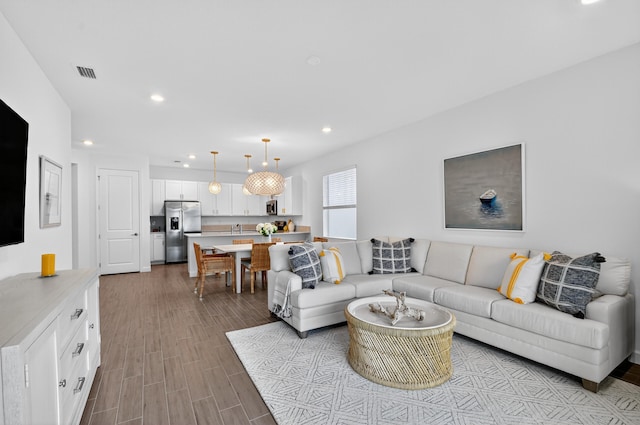 14929 Three Ponds Trl, Delray Beach, FL 33446 - living area featuring recessed lighting and wood finished floors