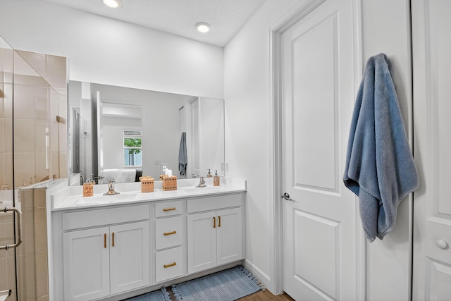 14929 Three Ponds Trl, Delray Beach, FL 33446 - bathroom with a shower stall, double vanity, and ensuite bath