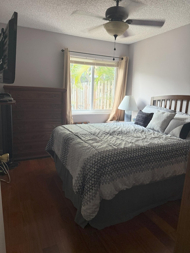 1131 SW 87th Ave, Pembroke Pines, FL 33025 - bedroom with wood finished floors, ceiling fan, and a textured ceiling
