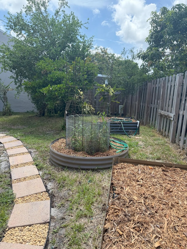 1131 SW 87th Ave, Pembroke Pines, FL 33025 - view of yard featuring a garden