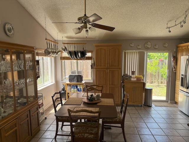 1131 SW 87th Ave, Pembroke Pines, FL 33025 - dining room with a textured ceiling, a ceiling fan, light tile patterned floors, and rail lighting