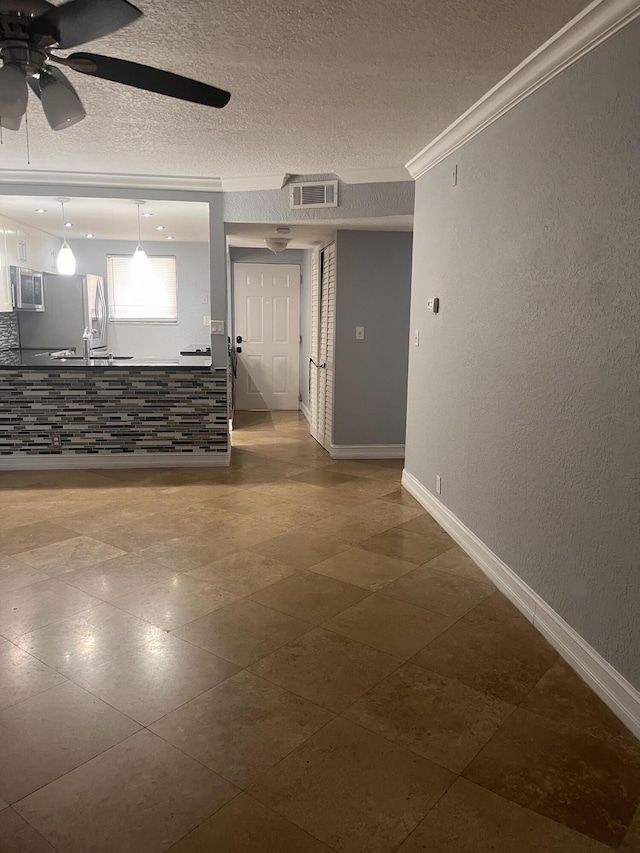 9467 Boca Cove Cir Unit 804, Boca Raton, FL 33428 - unfurnished living room with ceiling fan and a textured ceiling