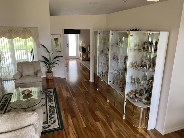 3053 SE Darien Rd, Port Saint Lucie, FL 34952 - living room featuring baseboards and wood finished floors