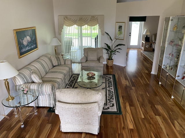 3053 SE Darien Rd, Port Saint Lucie, FL 34952 - living room featuring wood finished floors and baseboards