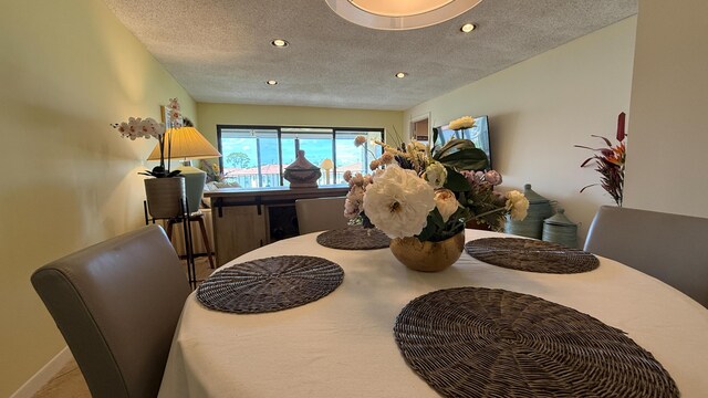 4090 Tivoli Ct Unit 303, Lake Worth, FL 33467 - dining space with a textured ceiling and recessed lighting