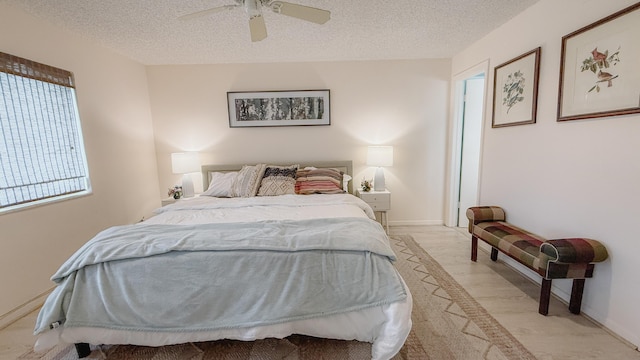4090 Tivoli Ct Unit 303, Lake Worth, FL 33467 - bedroom with a textured ceiling and ceiling fan