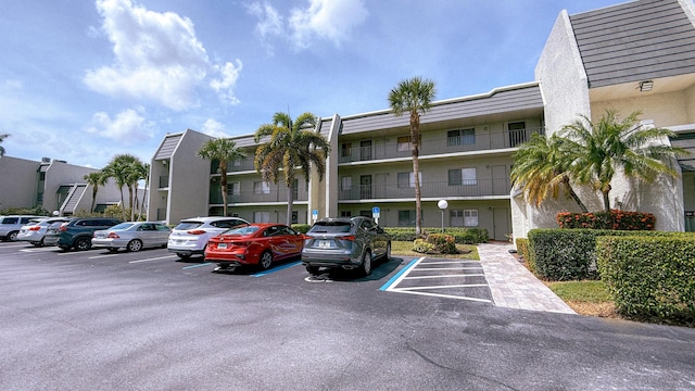 4090 Tivoli Ct Unit 303, Lake Worth, FL 33467 - view of property with uncovered parking