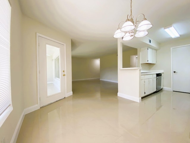 815 W Boynton Beach Blvd Unit 7-102, Boynton Beach, FL 33426 - kitchen featuring dishwasher, a chandelier, white cabinets, light countertops, and pendant lighting
