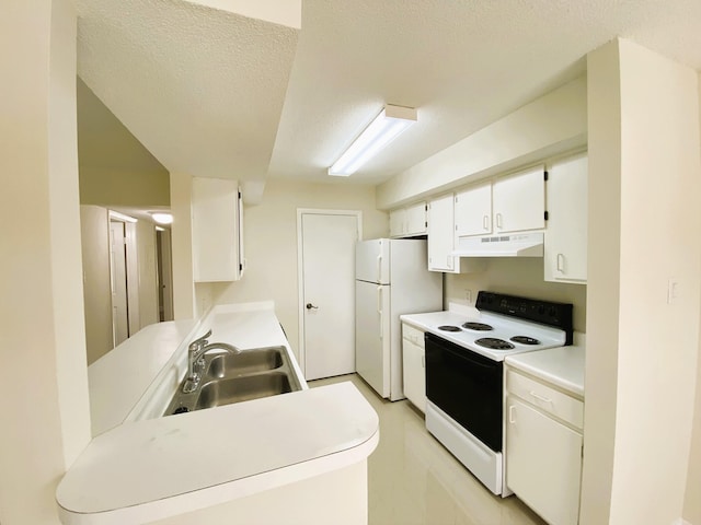 815 W Boynton Beach Blvd Unit 7-102, Boynton Beach, FL 33426 - kitchen with white appliances, under cabinet range hood, white cabinets, a textured ceiling, and light countertops