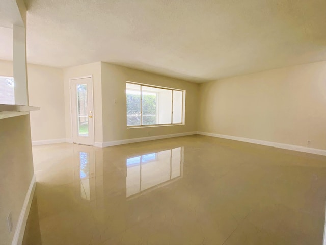 815 W Boynton Beach Blvd Unit 7-102, Boynton Beach, FL 33426 - empty room featuring baseboards