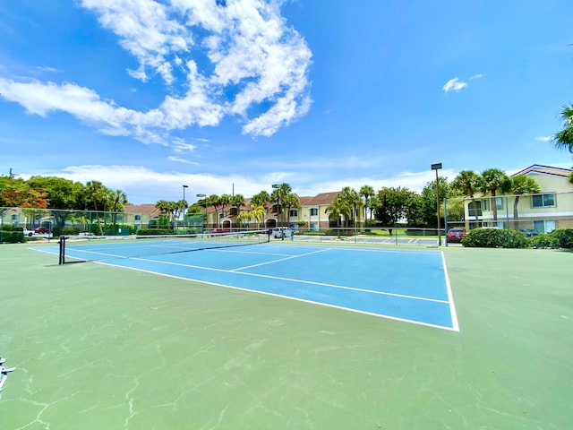 815 W Boynton Beach Blvd Unit 7-102, Boynton Beach, FL 33426 - view of tennis court with community basketball court