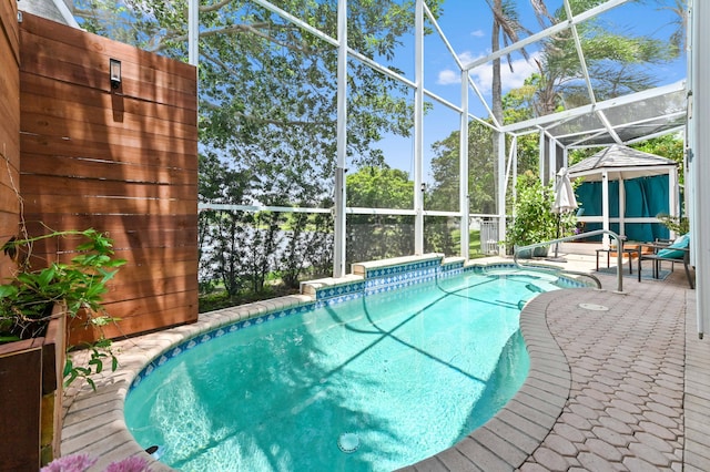 5210 NW 53rd Ave, Coconut Creek, FL 33073 - swimming pool featuring a patio and glass enclosure