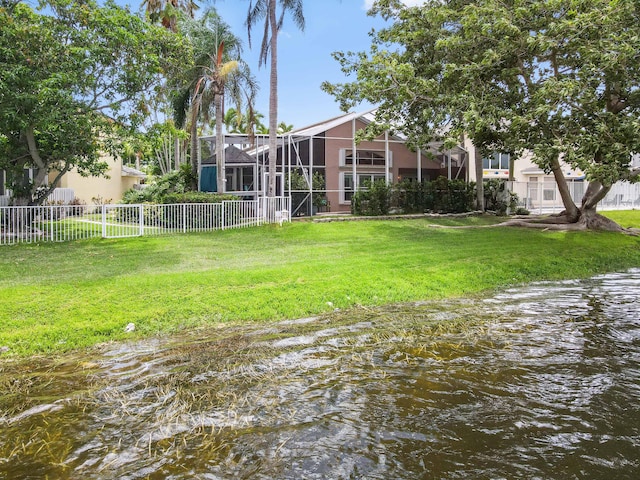 5210 NW 53rd Ave, Coconut Creek, FL 33073 - view of yard featuring glass enclosure and a water view