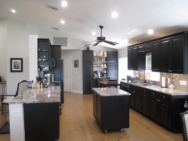 6314 Water Lilly Ln, Boynton Beach, FL 33437 - kitchen with open shelves, dark cabinetry, a ceiling fan, vaulted ceiling, and recessed lighting