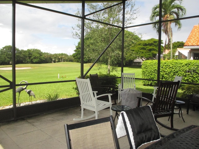6314 Water Lilly Ln, Boynton Beach, FL 33437 - sunroom with view of golf course and healthy amount of natural light