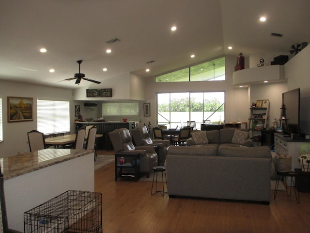 6314 Water Lilly Ln, Boynton Beach, FL 33437 - living room with healthy amount of natural light, high vaulted ceiling, wood finished floors, a ceiling fan, and recessed lighting