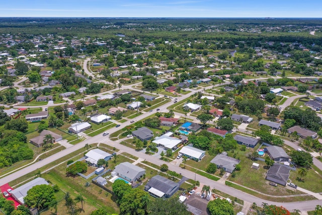 372 NE Ardsley Dr, Port Saint Lucie, FL 34983 - aerial overview of property's location with nearby suburban area